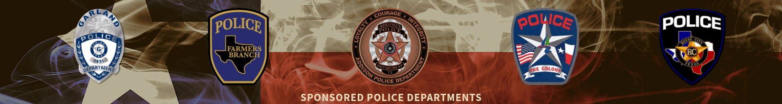 A group of police badges are lined up in front of a texas flag