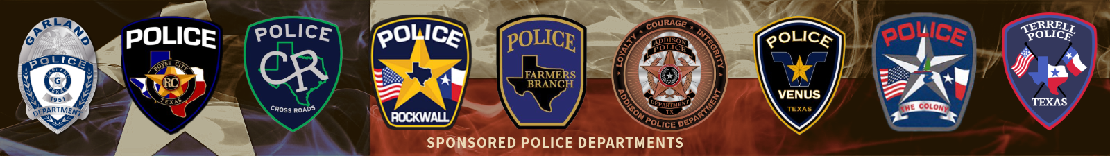 A group of police badges are lined up in front of a texas flag