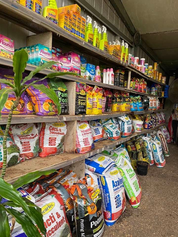 A Store Filled With Lots of Bags of Fertilizer and Chemicals — Junction Hill Nursery in Junction Hill, NSW