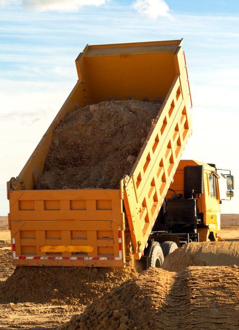 Unloading Soil — Copp & Co Civil & Plant Hire in Proserpine, QLD
