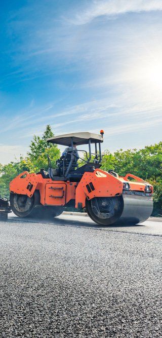 Rolling on a New Asphalt — Copp & Co Civil & Plant Hire in Airlie Beach, QLD
