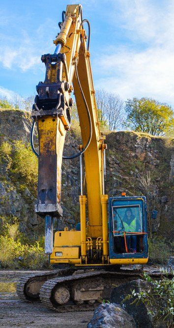 Yellow Digger on Quarry — Copp & Co Civil & Plant Hire in Bowen, QLD