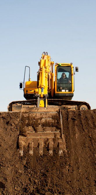 A Large Yellow Excavator — Copp & Co Civil & Plant Hire in Mount Julian, QLD
