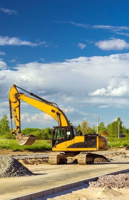 A Yellow Excavator is Working on a Construction Site — Copp & Co Civil & Plant Hire in Proserpine, QLD