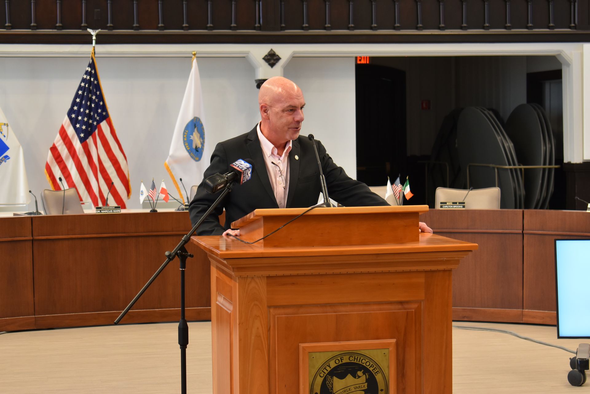 City Councilor Brooks speaks at podium