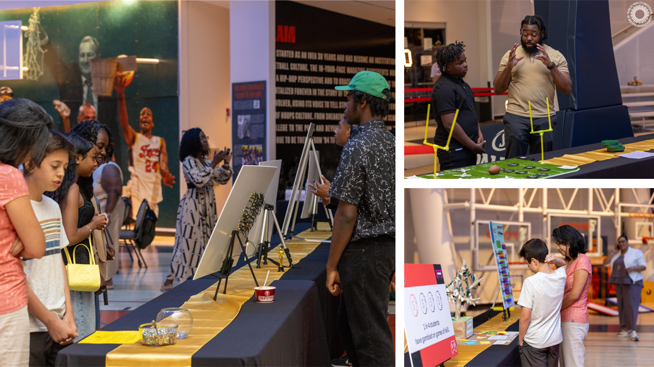 People walk around looking at data visualizations