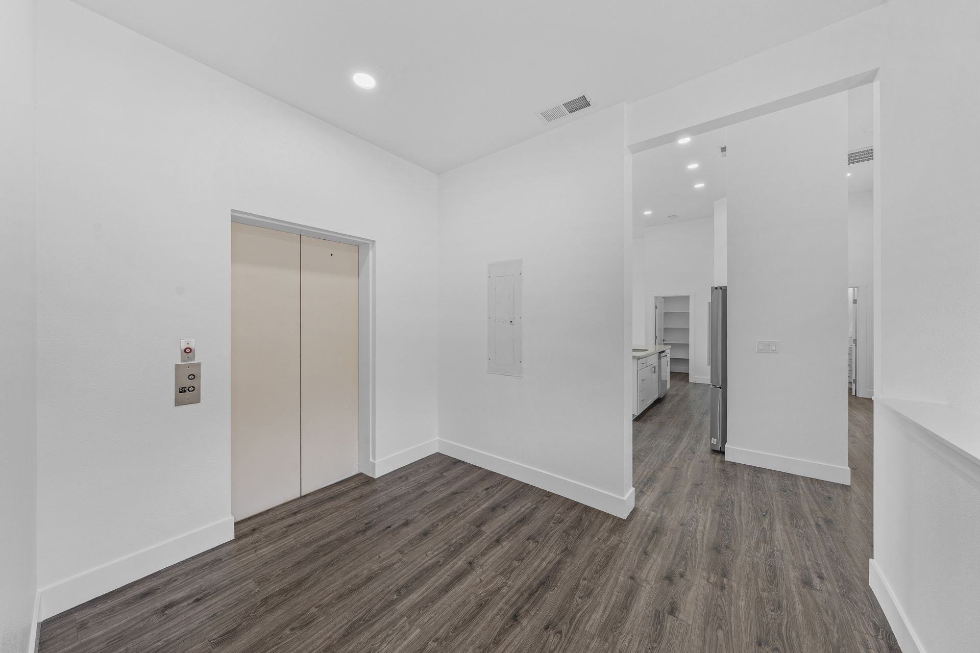 There is an elevator in the middle of the room.