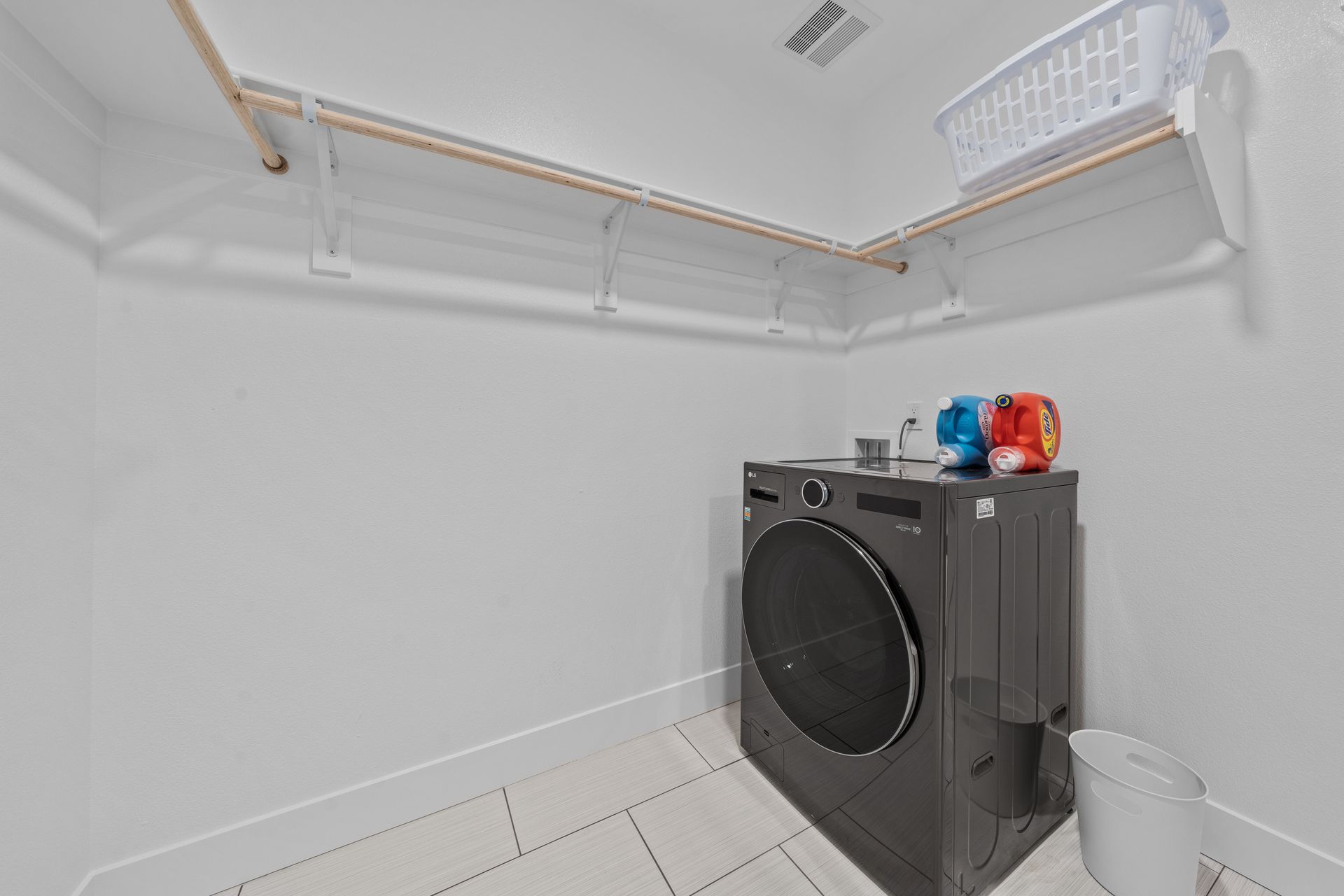 There is a washer and dryer in the laundry room.