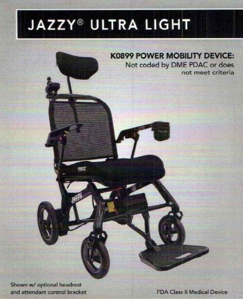 A blue mobility scooter is parked on the side of the road.