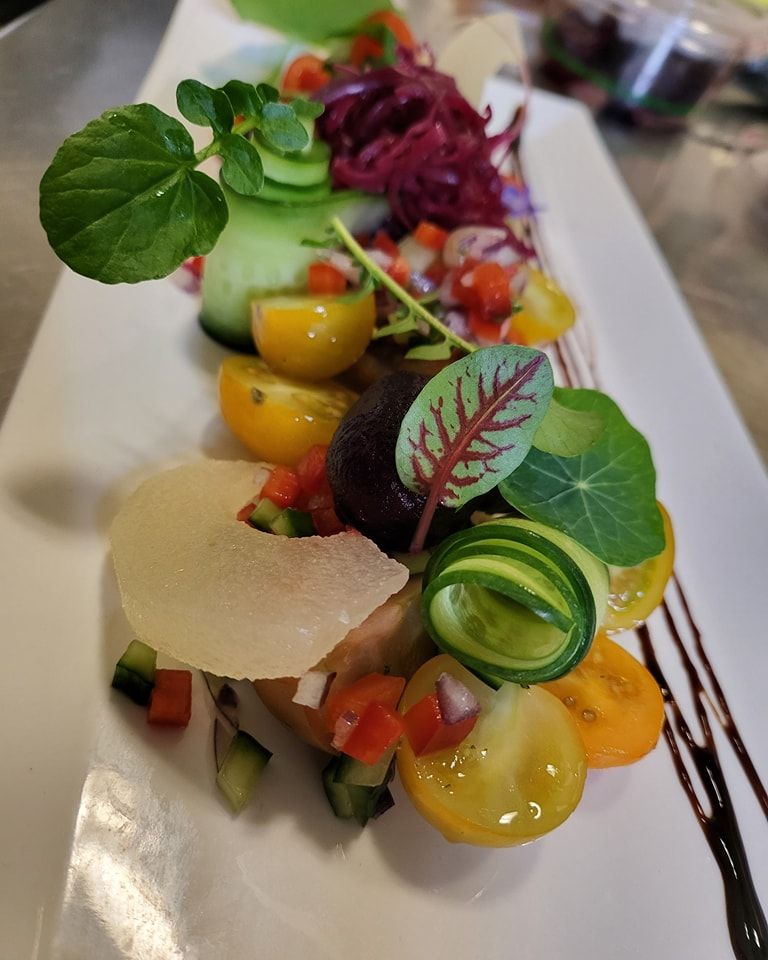 Deconstructed Salad on a White Plate: Yellow and Red Tomatoes — Chefs2Go in Cairns, QLD