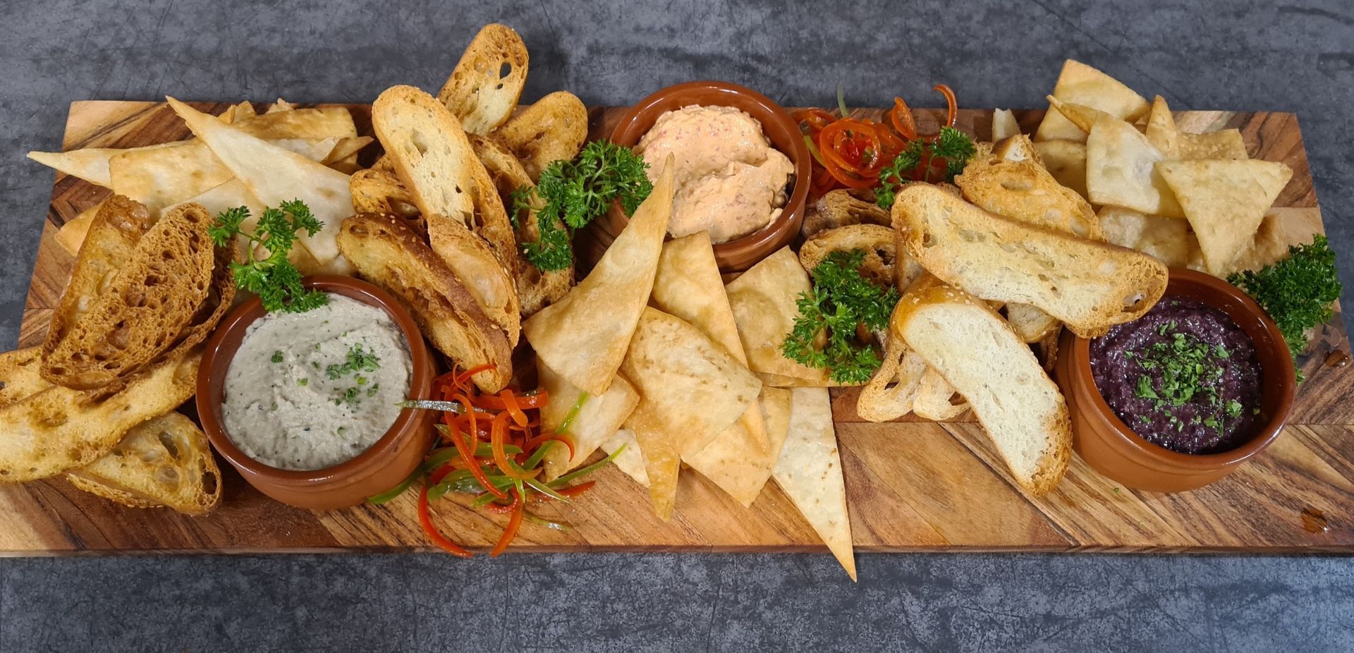 A Wooden Platter of Bread, Chips, and Dips — Chefs2Go in Alice Springs, NT