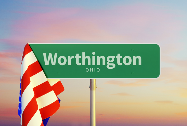 A green street sign for Worthington Ohio