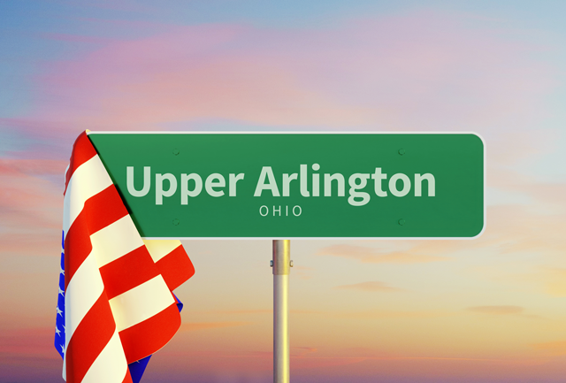 A green street sign for Upper Arlington Ohio