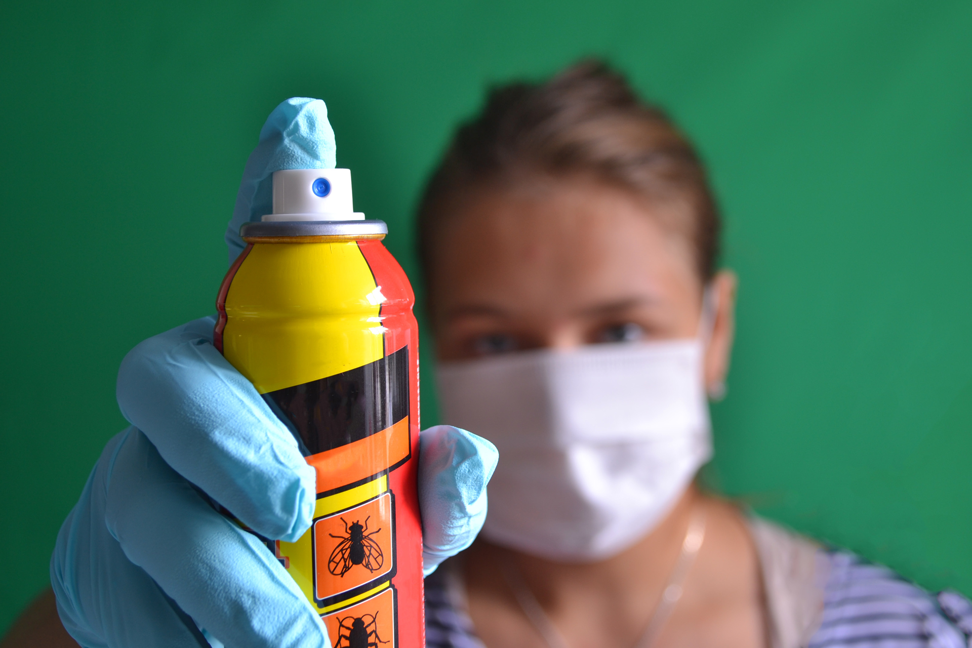 Woman With Pesticide Spray