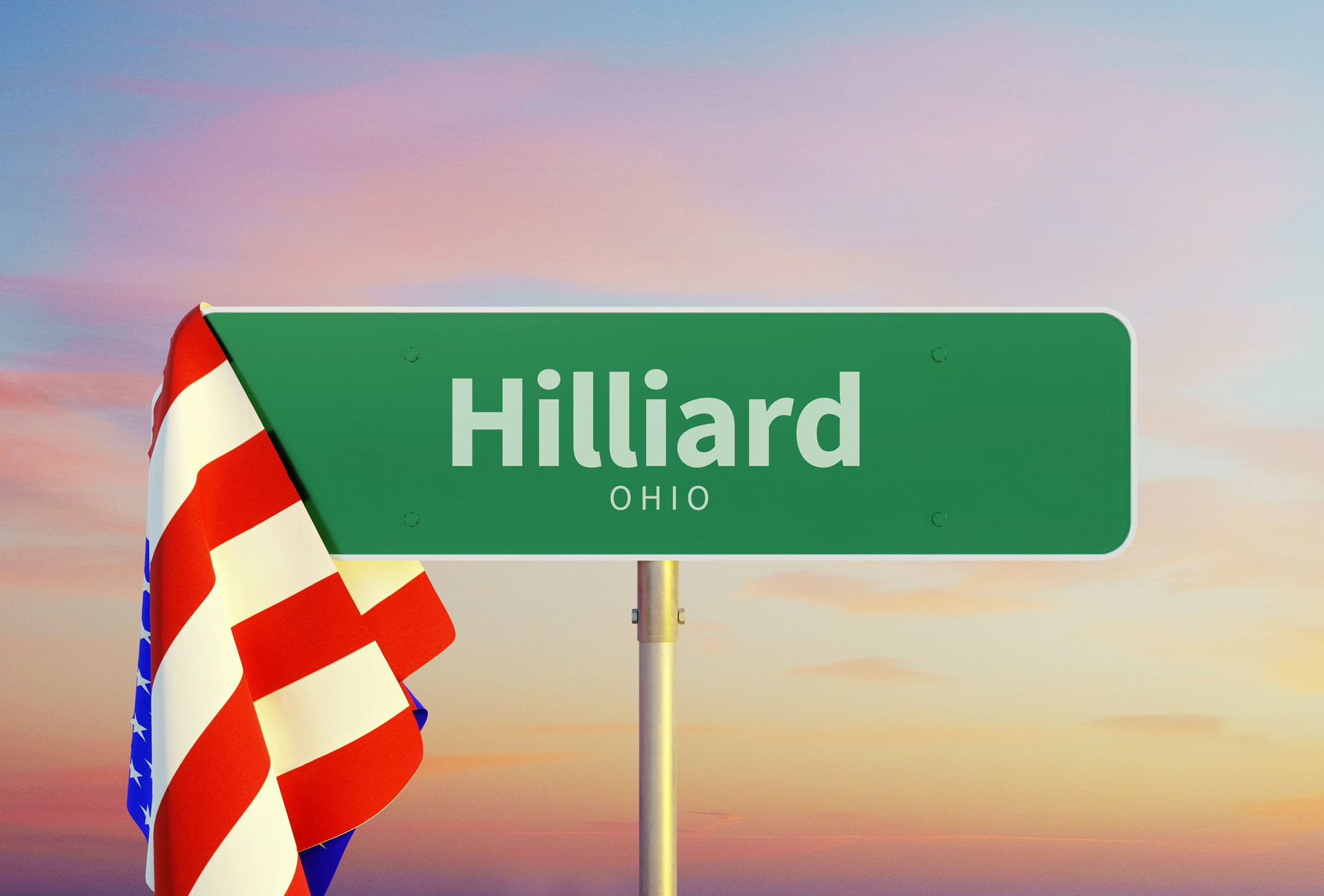 A street sign for Hilliard Ohio with an American flag