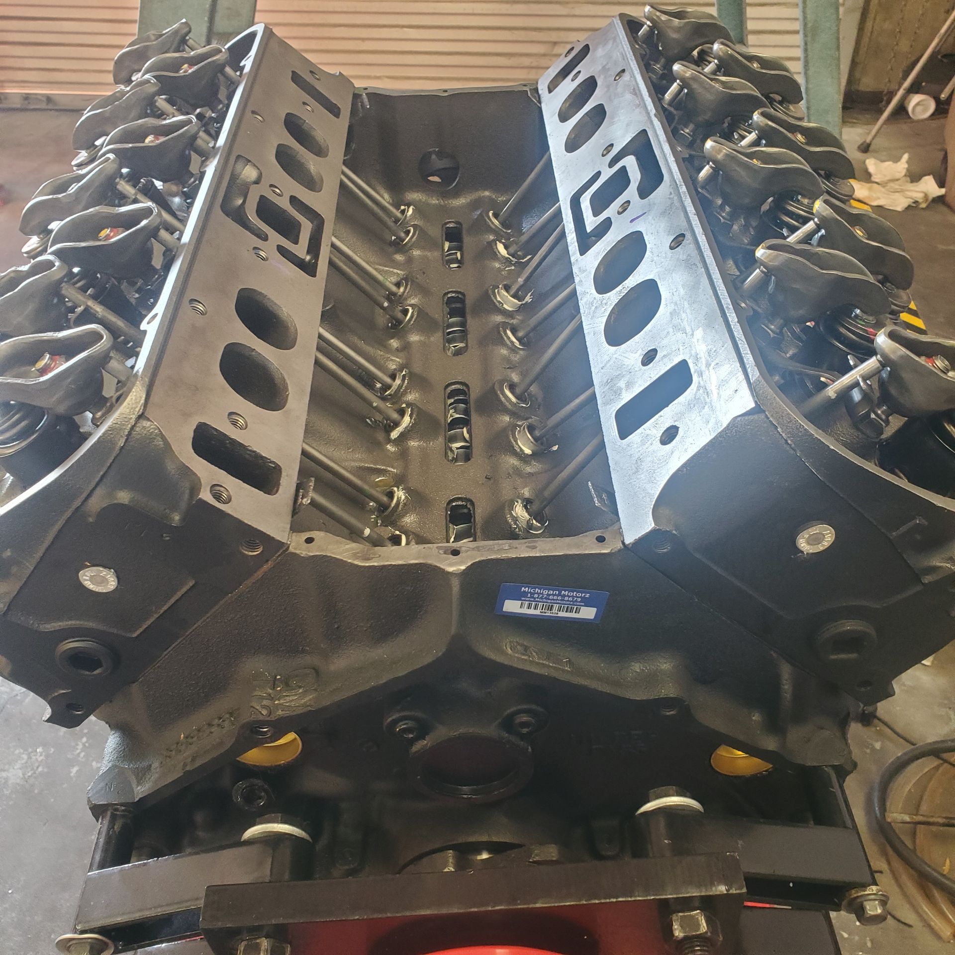 A close up of a large engine with the number 100 on it