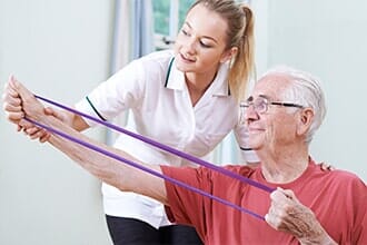 Senior Male Working With therapist — Physical Therapist in Old Bridge, NJ