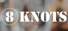 A white logo consisting of the number 8 inside a circle followed by the word "KNOTS" in a stencil-style font.