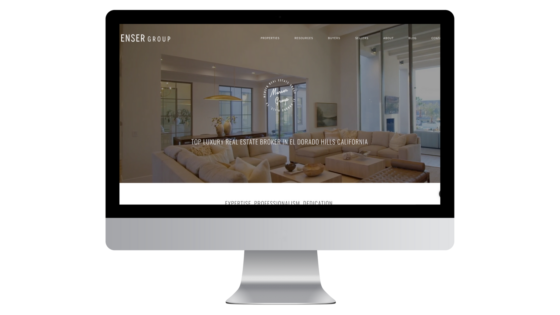A computer monitor with a living room on the screen.