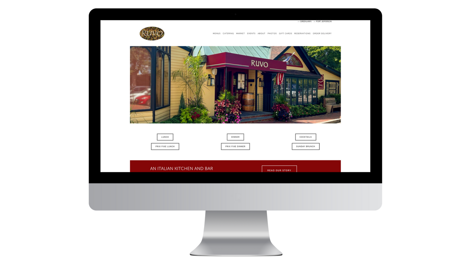 A computer monitor is displaying a website for a restaurant.