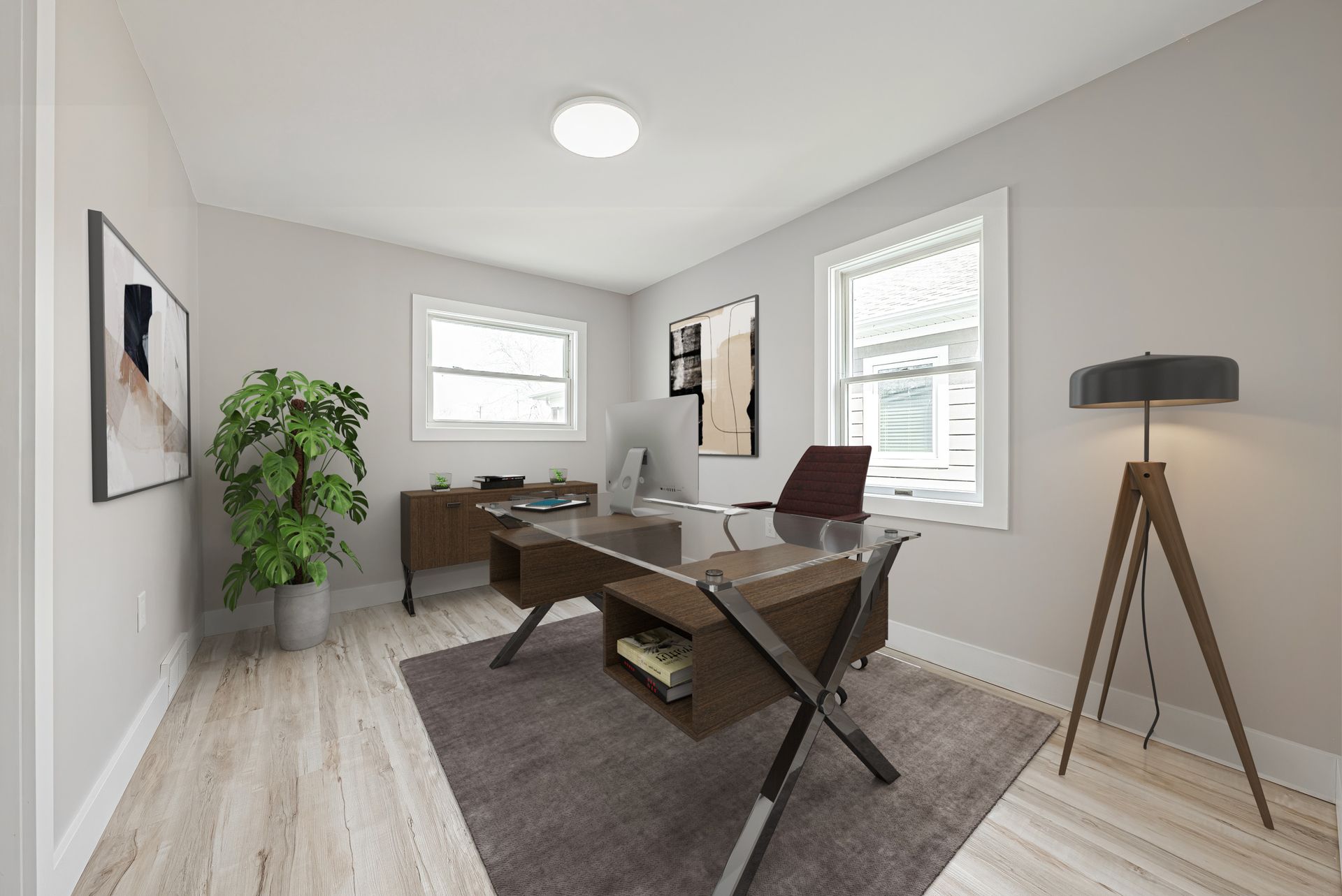 A home office with a desk , chair and lamp. Staged photo