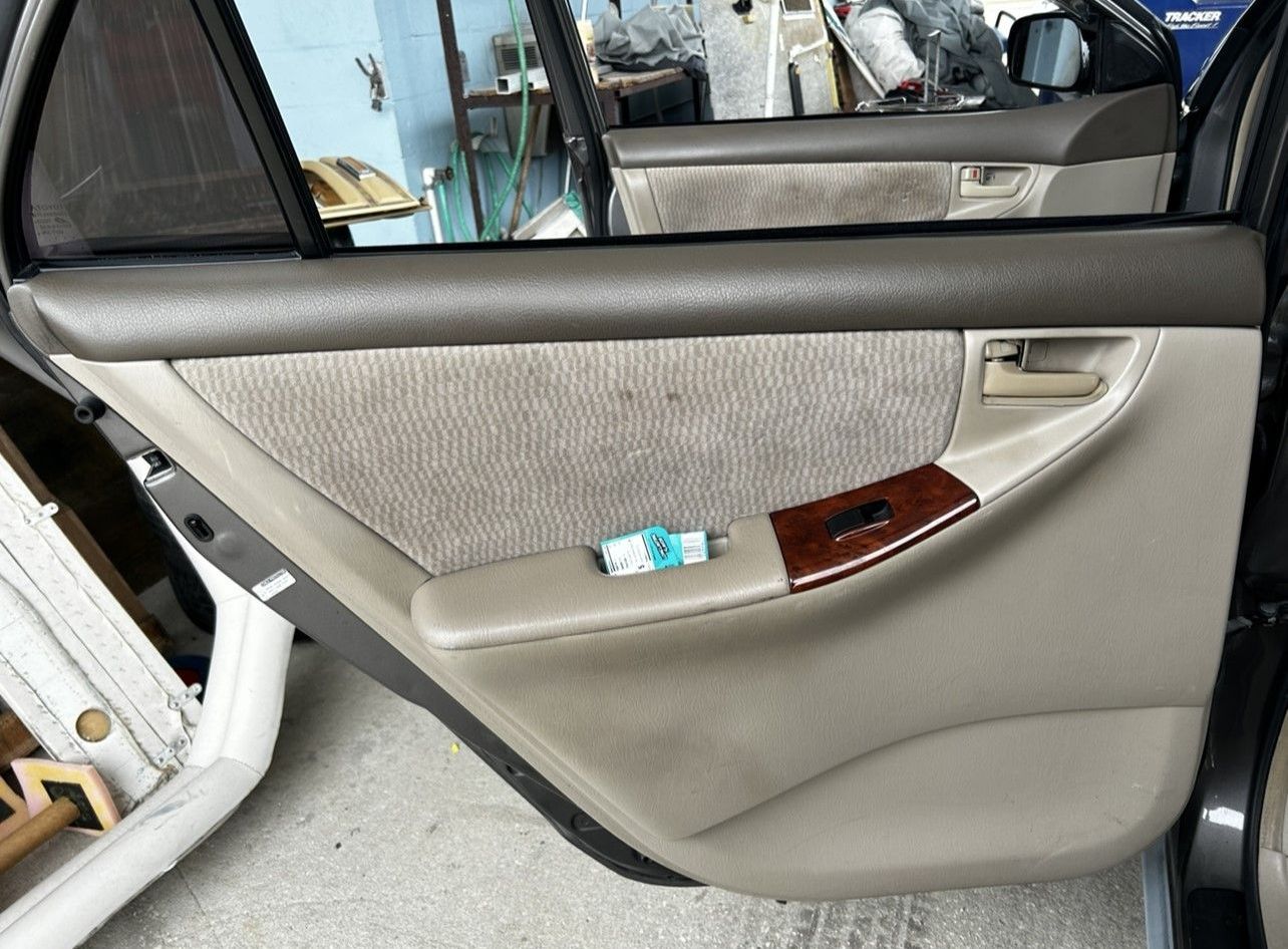 Door Panel Before  - Melbourne, FL - A & E Auto and Boat Upholstery