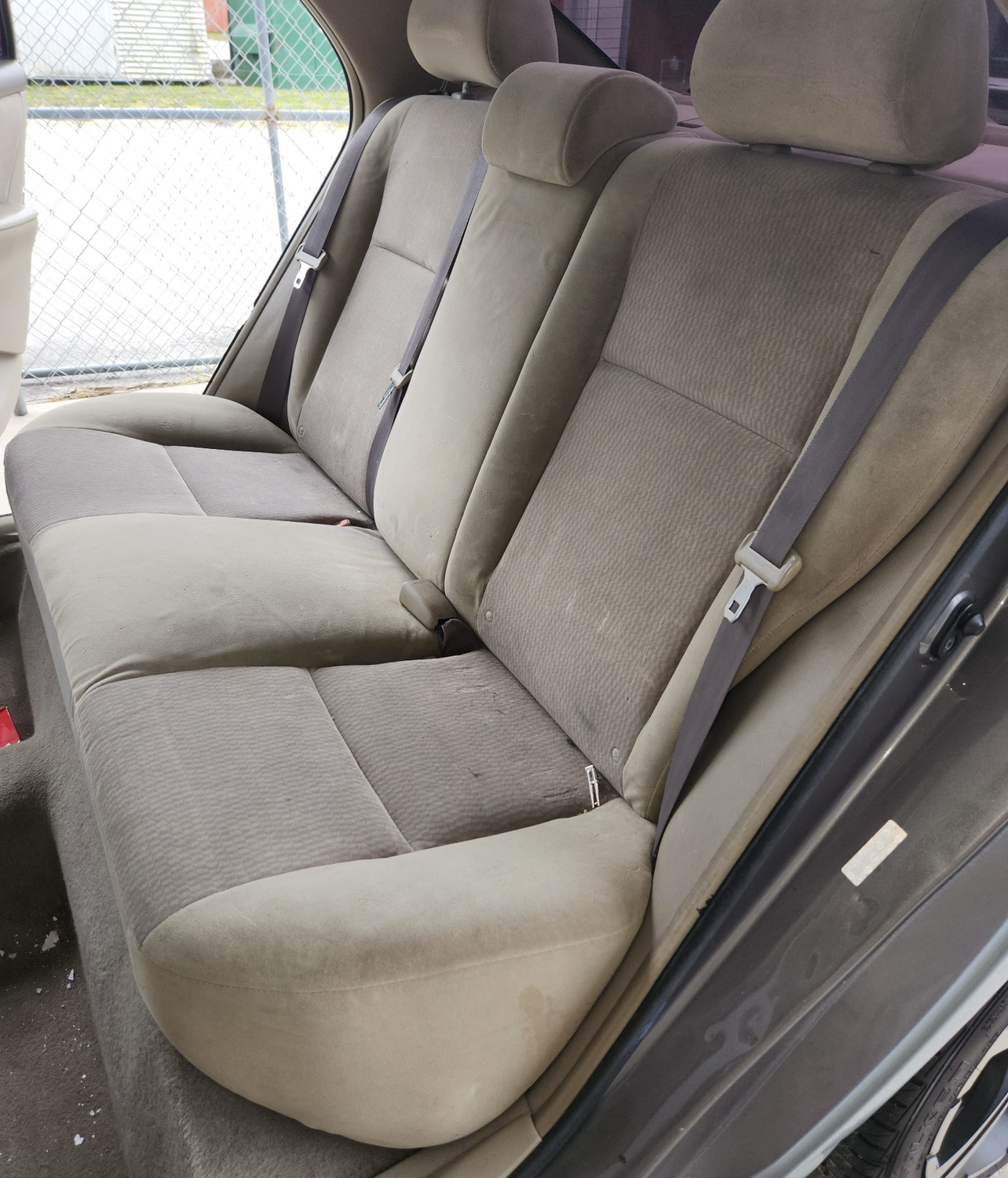 Back Tan Seats Before - Melbourne, FL -A & E Auto and Boat Upholstery