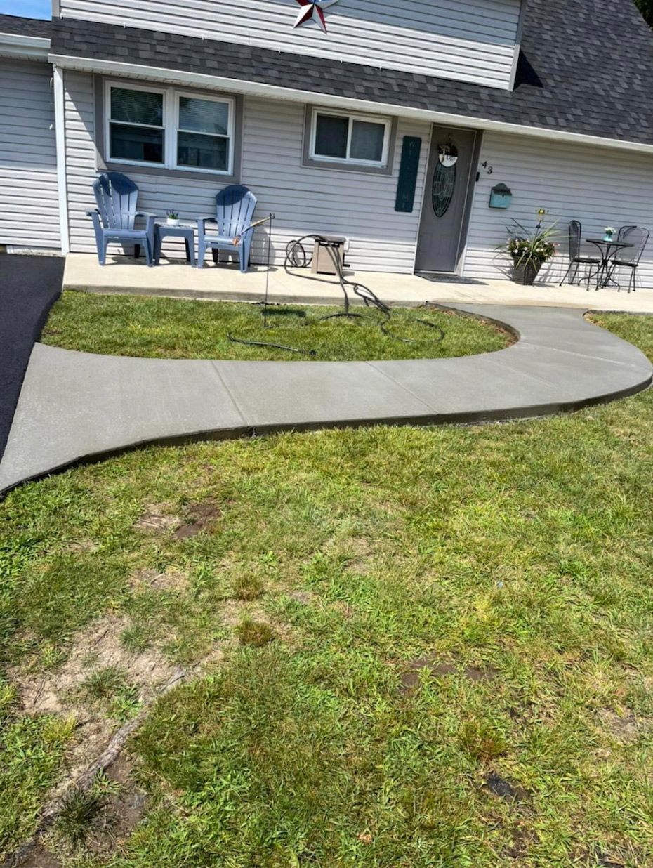 Curve of Walkway in Garden — Bensalem, PA — P&N Concrete & Sealcoating