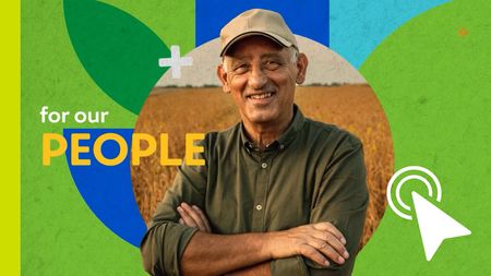 Man smiling with crossed arms over green-and-yellow graphic reading “for our PEOPLE” and a white cursor icon