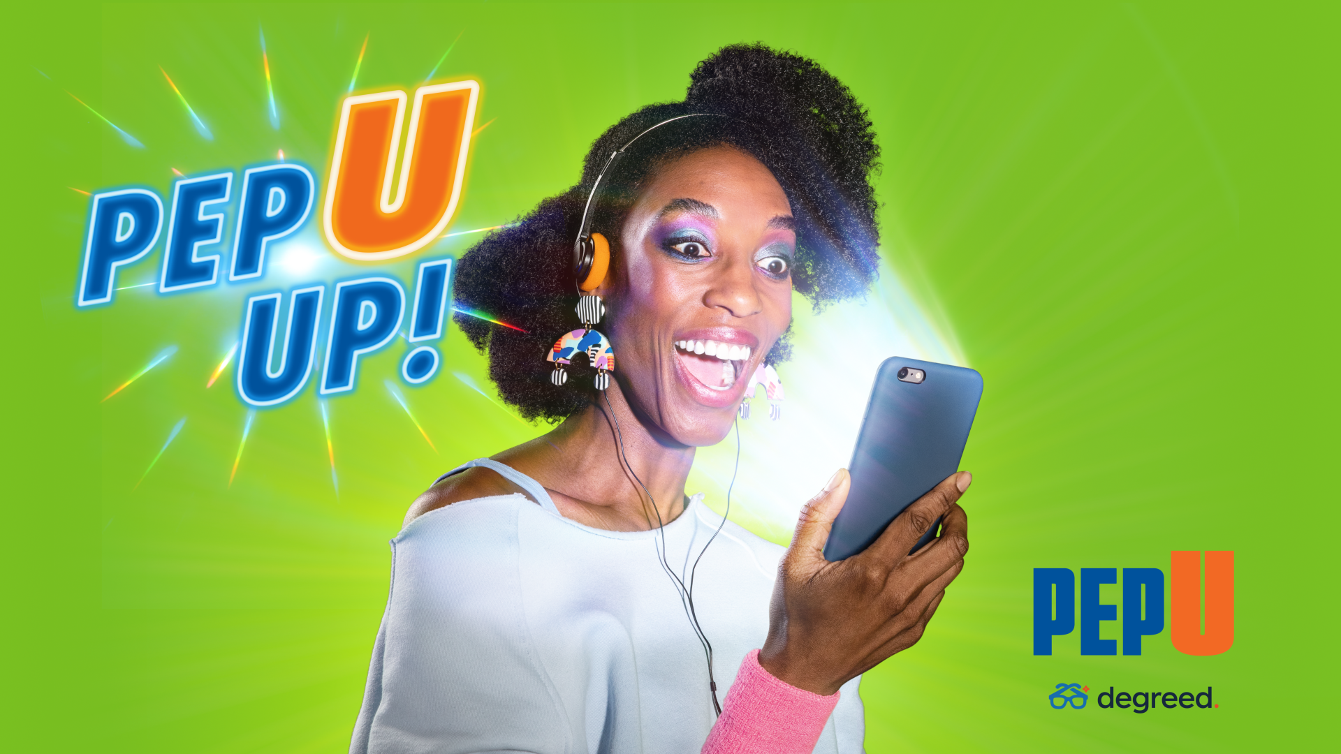 A woman is holding a cell phone in her hand and smiling.