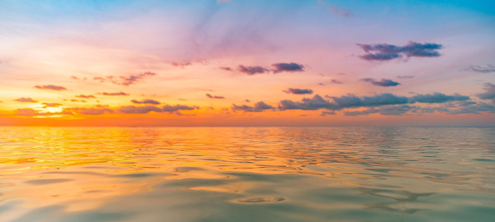 A beautiful sunset over the ocean. Couples retreat  in Orlando, FL can help your reconnect with your partner. Intimacy workshops and couples retreats in Florida, Georgia, North Carolina and beyond.