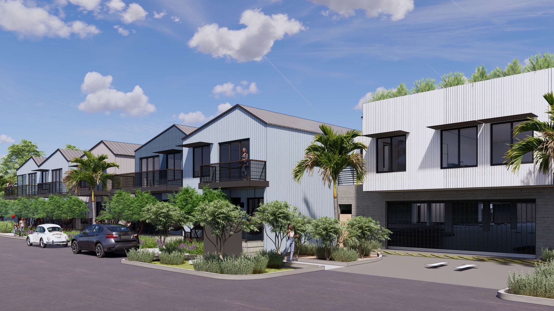 Row of modern homes with dark roofs, balconies, and landscaping on a street. Cars are parked.