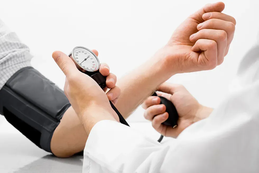 patient getting blood pressure taken