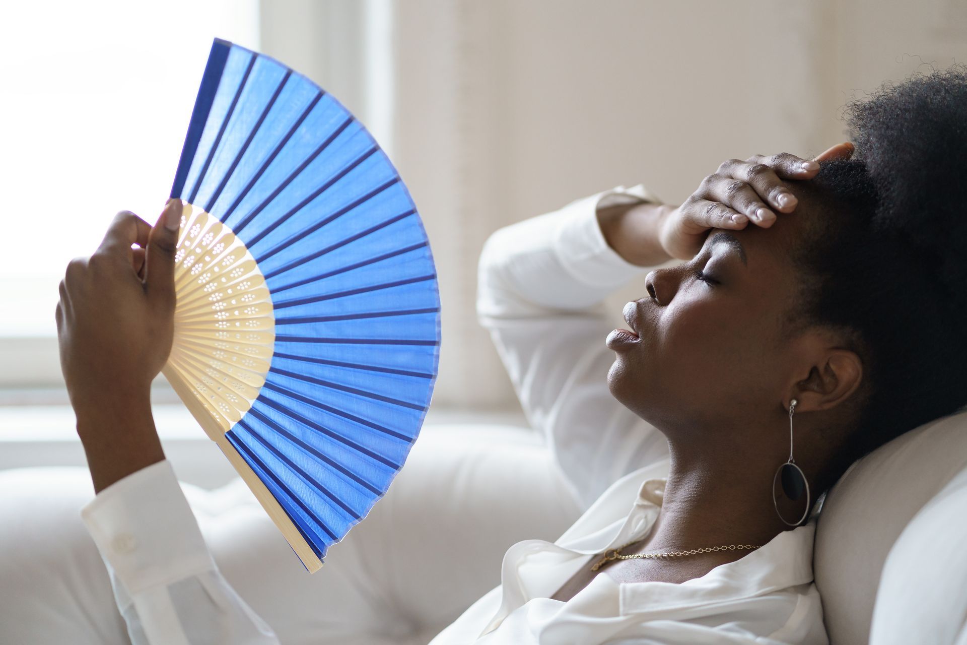 Woman suffering from heat stroke