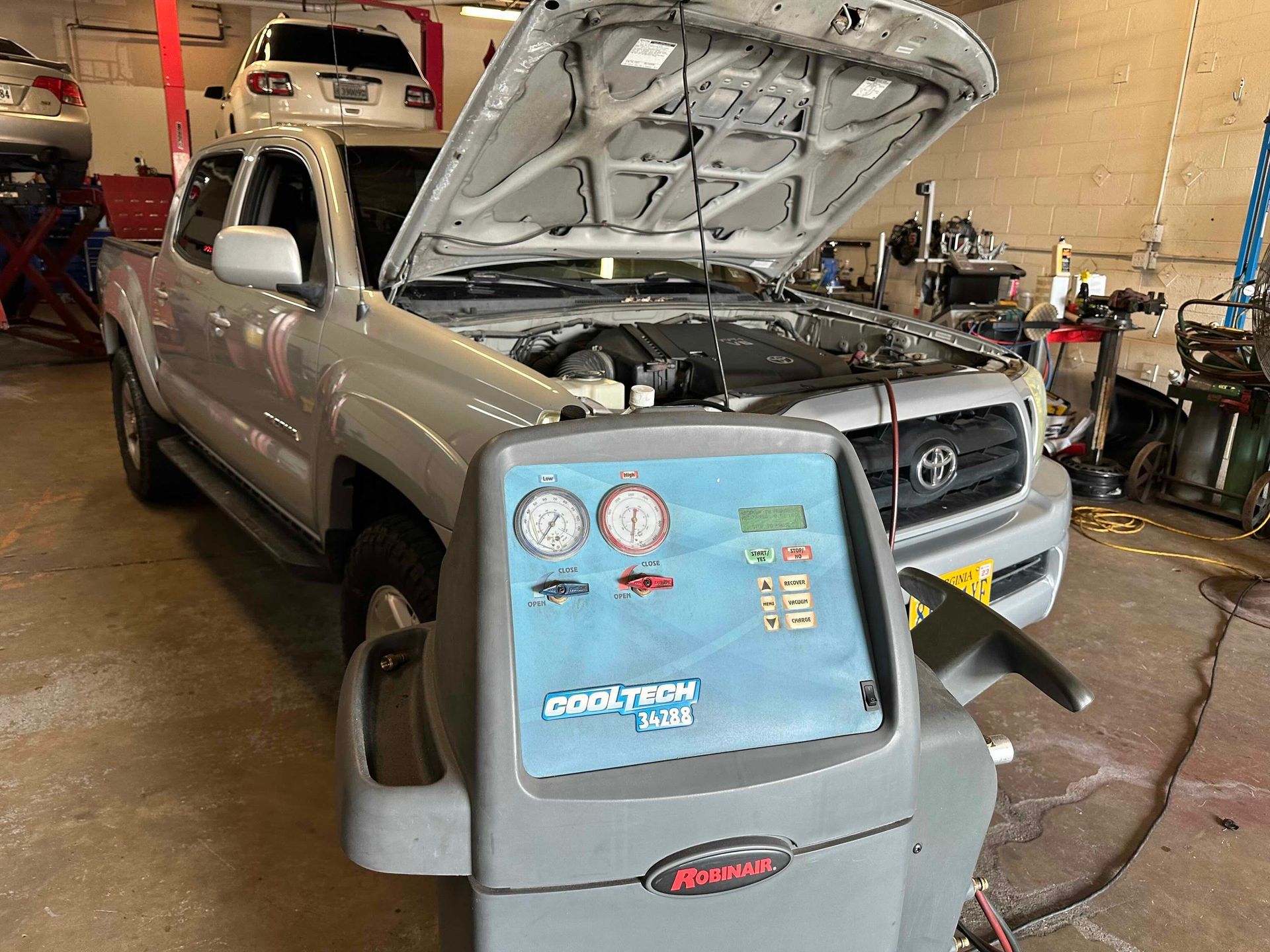Toyota Truck Undergoing Air Conditioning Service | Premier Auto LLC