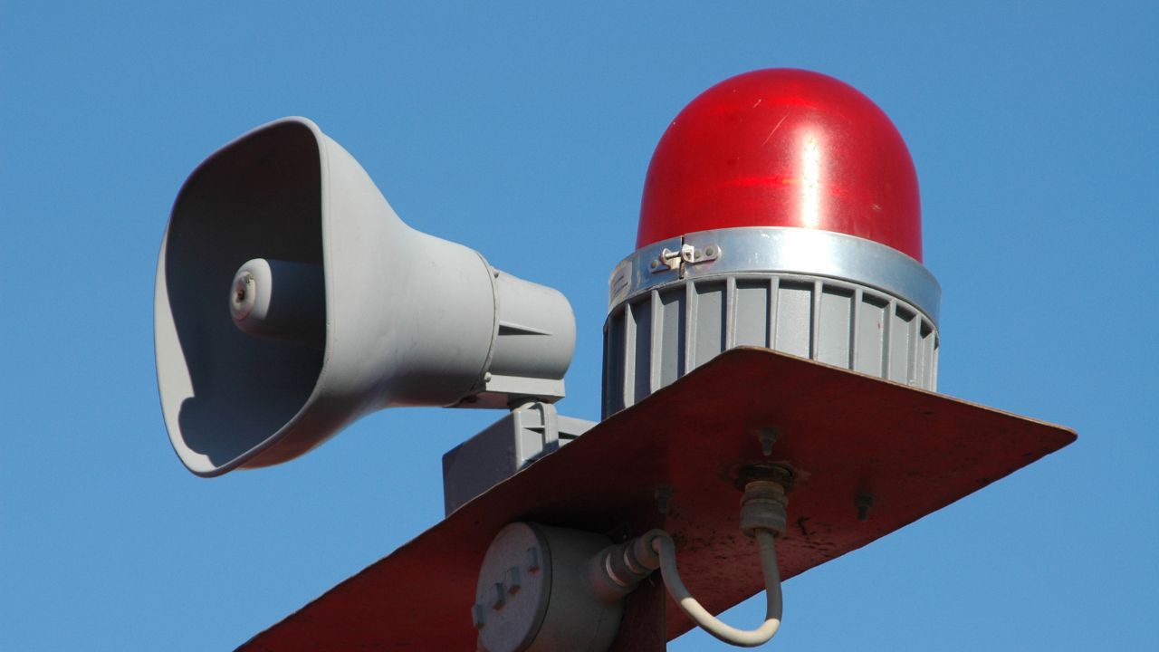 A red light with a speaker attached to it