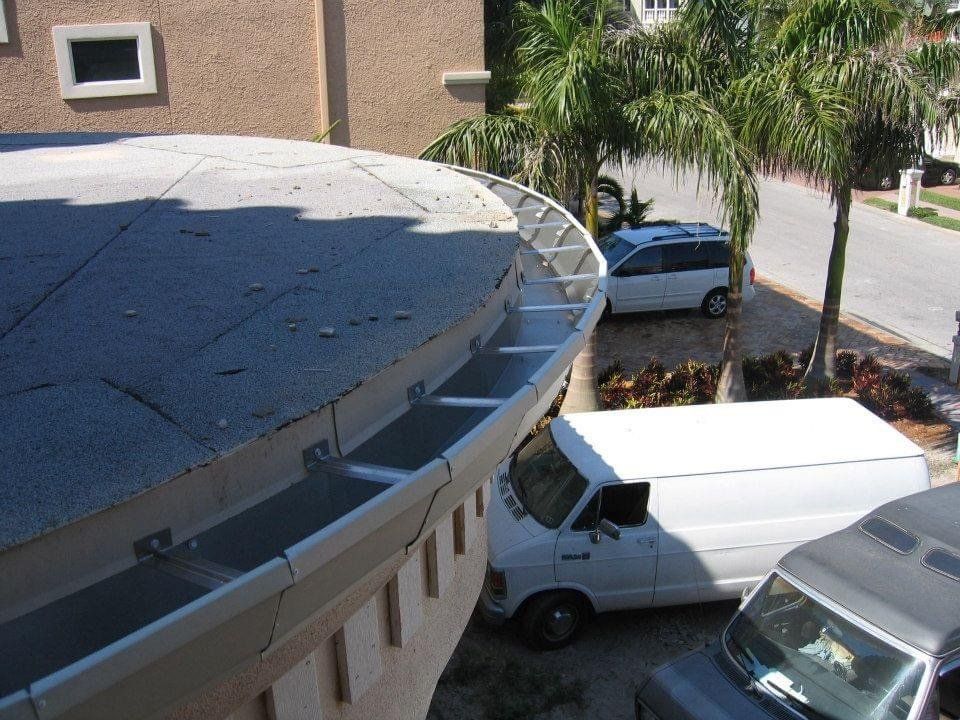 Safely Cover Sharp — Palm Harbor, FL — Sure Fit Gutters