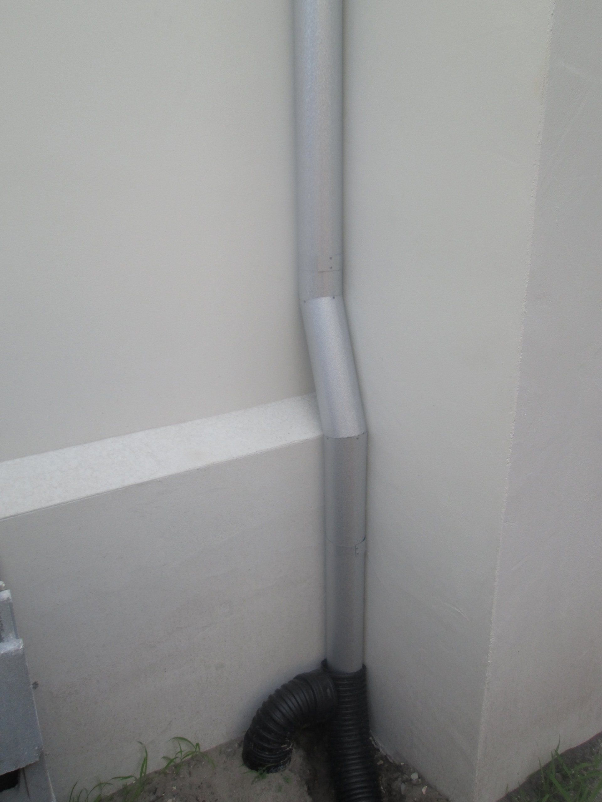 30° White Color Downspout — Palm Harbor, FL — Sure Fit Gutters