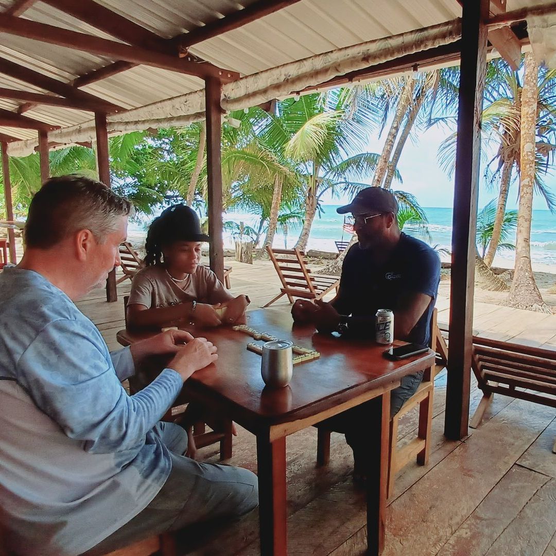 playing dominos at  camaroncito ecoresort and beach in panama