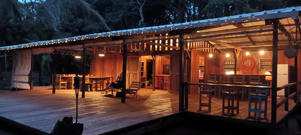 social area at night at camaroncito ecoresort and beach in panama