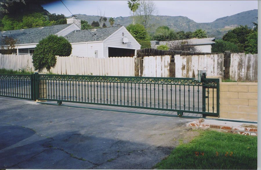 Green Colored Sliding Gate — Ste. K Santee, CA — Sam's Fencing Inc.