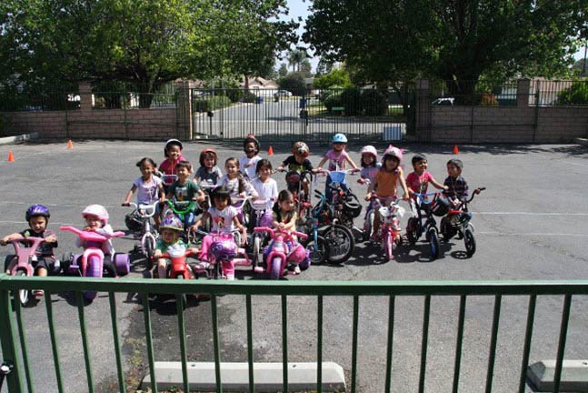 Preschoolers in Their Bicycle — Riverside, CA — Cottonwood Montessori