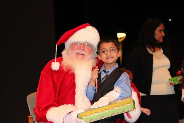 Little Boy Holding a Gift — Riverside, CA — Cottonwood Montessori