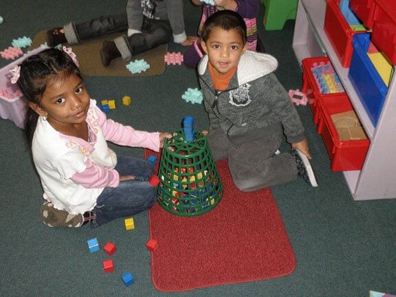 Two Kids Playing Toy Blocks — Riverside, CA — Cottonwood Montessori