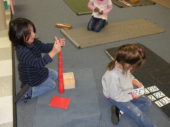 Little Girls Playing Educational Game — Riverside, CA — Cottonwood Montessori