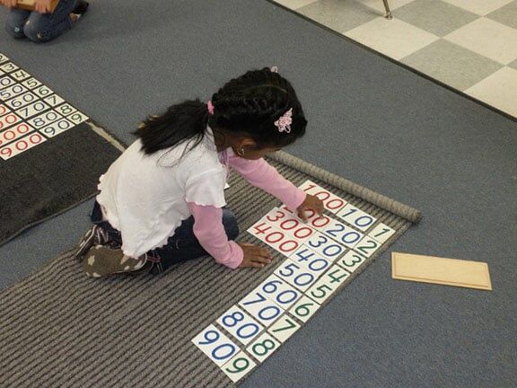 Little Girl Constructing Numbers — Riverside, CA — Cottonwood Montessori