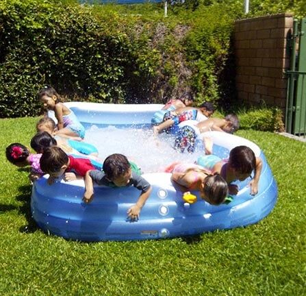 Children in Inflatable Pool — Riverside, CA — Cottonwood Montessori