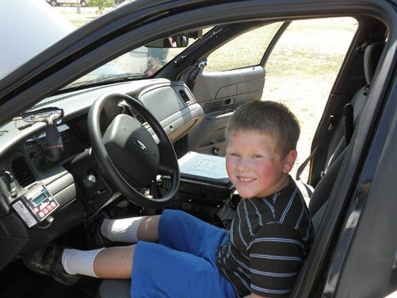 Little Boy in Police Car — Riverside, CA — Cottonwood Montessori