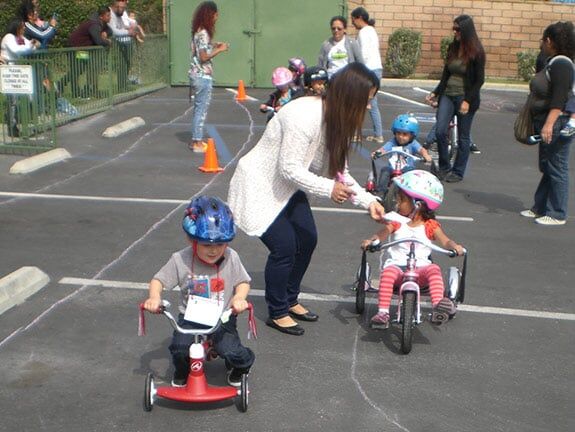 Children Learning to Ride a Trike — Riverside, CA — Cottonwood Montessori