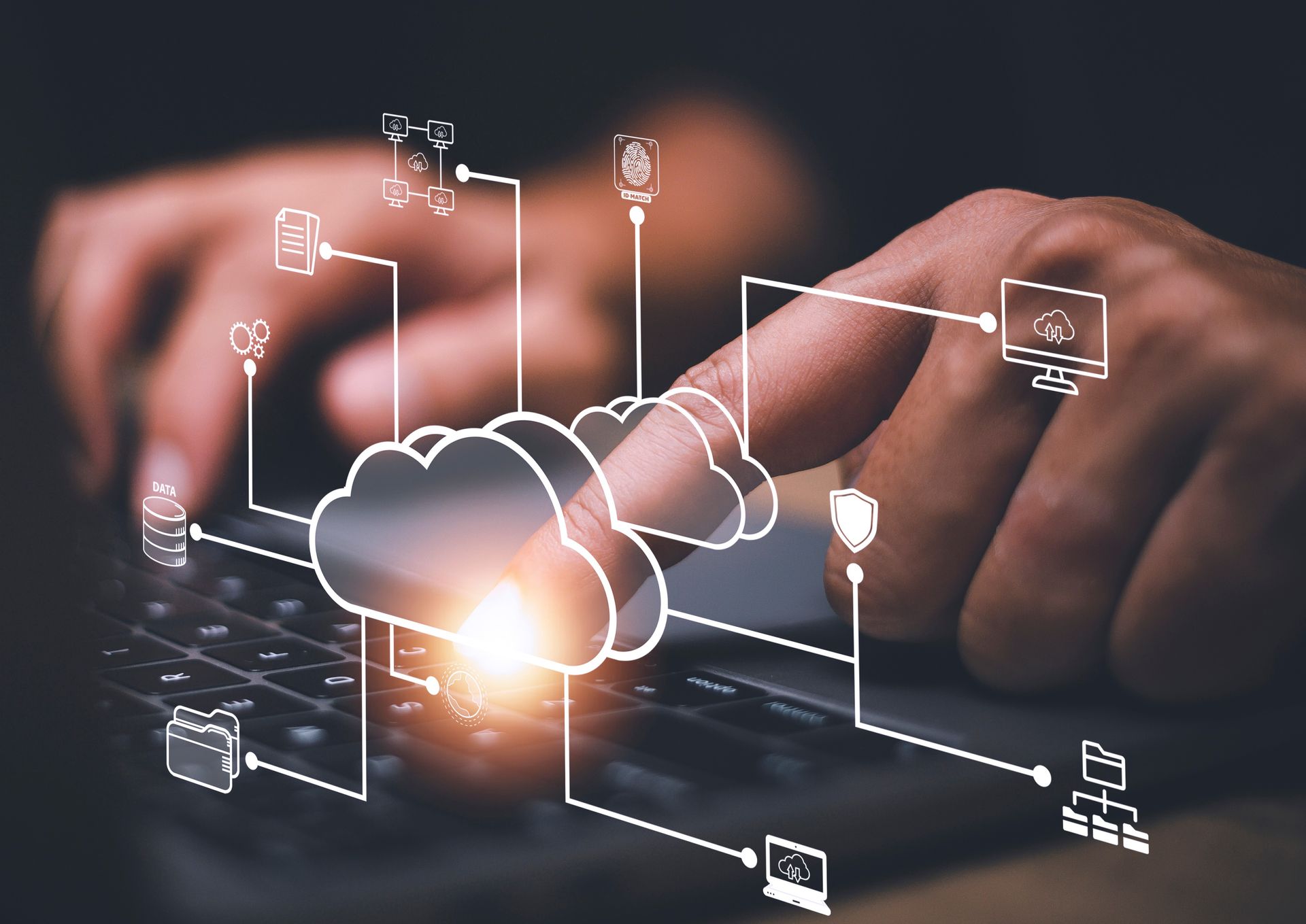 Hand touching glowing cloud icon with connected digital network symbols on a dark background